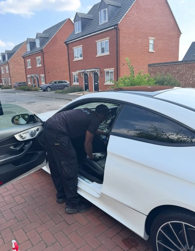 Gideon detailing the interior of a Mercedes C-Class